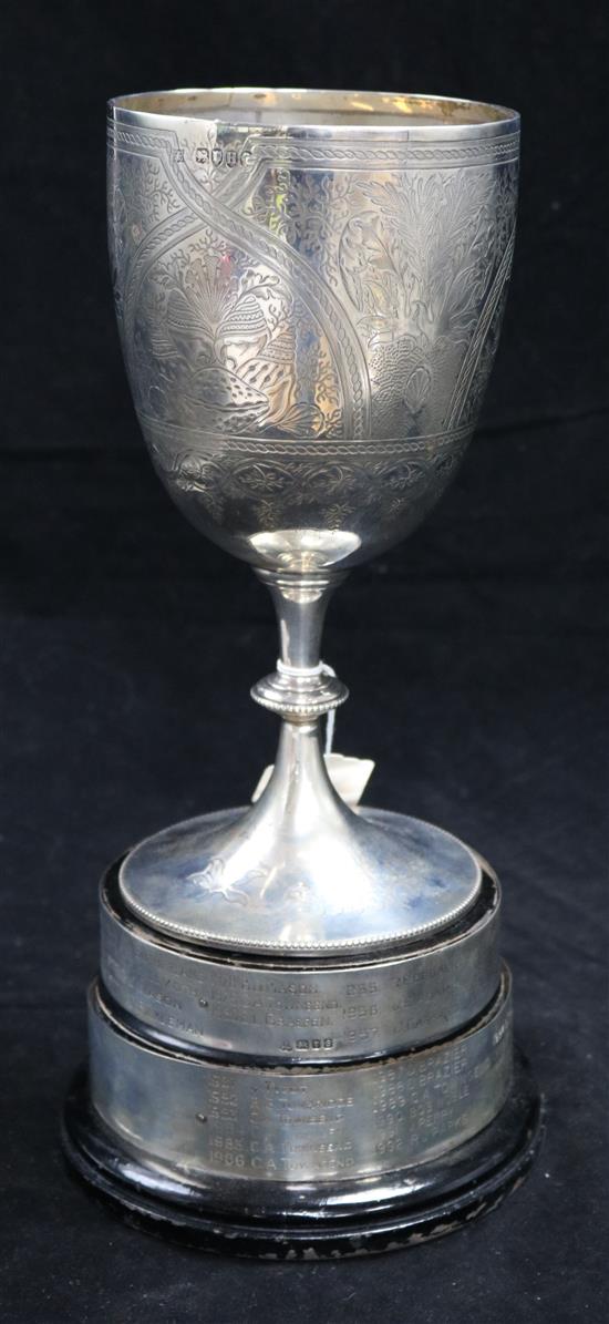 A Victorian silver Savoy Golf Club presentation trophy cup on ebonised socle engraved with past winners, 15 oz.